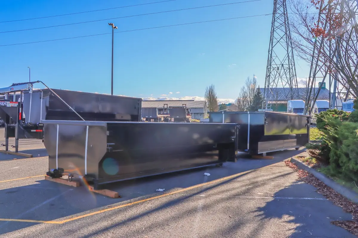 Roll-off dumpster ready for waste disposal at job site for 15 Yard Dumpster Rental in New Castle
